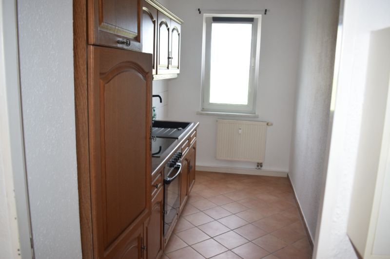 Einraumwohnung mit Einbauküche und PKW Stellplatz in Grüner Lage